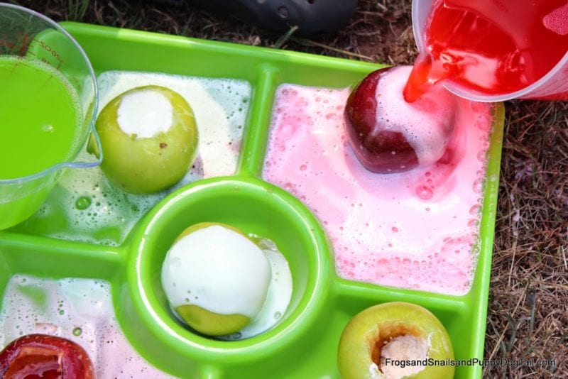 Apple erupting like volcanos as an example of science experiments for Johnny Appleseed Day