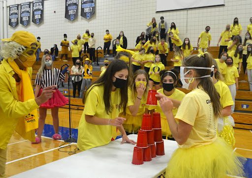 Blind Folded Stacking Cups Children playing with blindfolds on