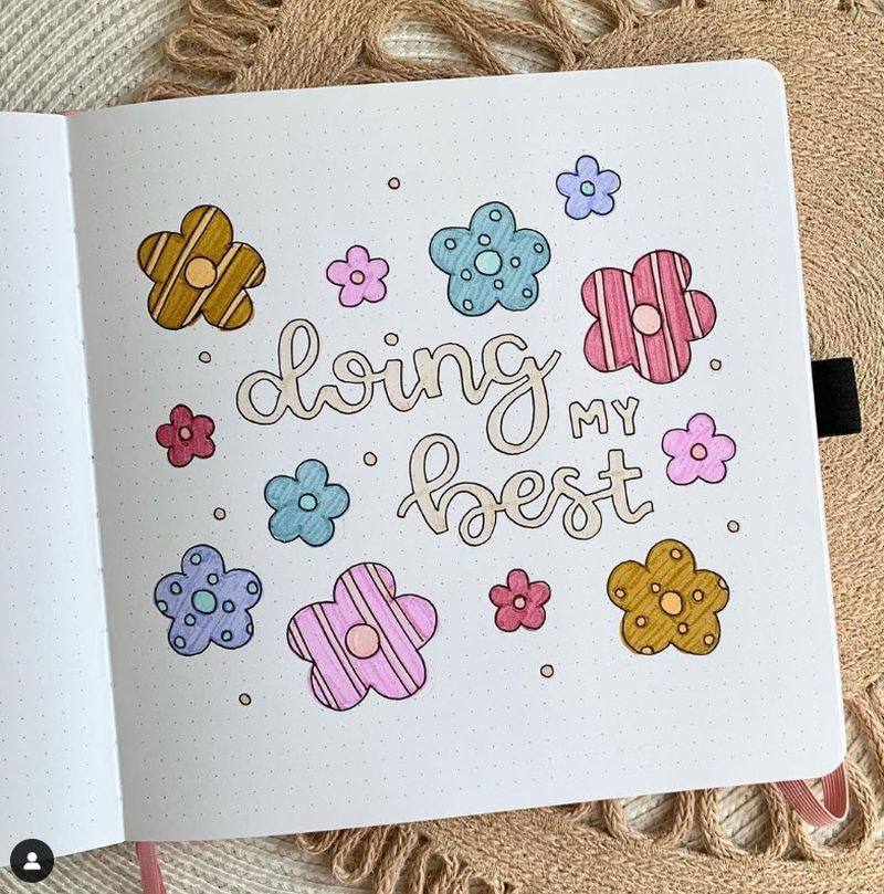 Bullet Journal Ideas: Doodles Doodles in a journal, with text reading Doing My Best surrounded by simple colorful flowers