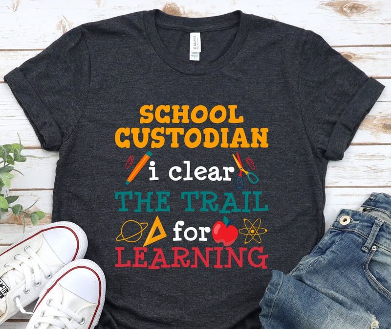 Custodian T-Shirt Black t-shirt with colorful text reading School Custodian: I clear the trail for learning