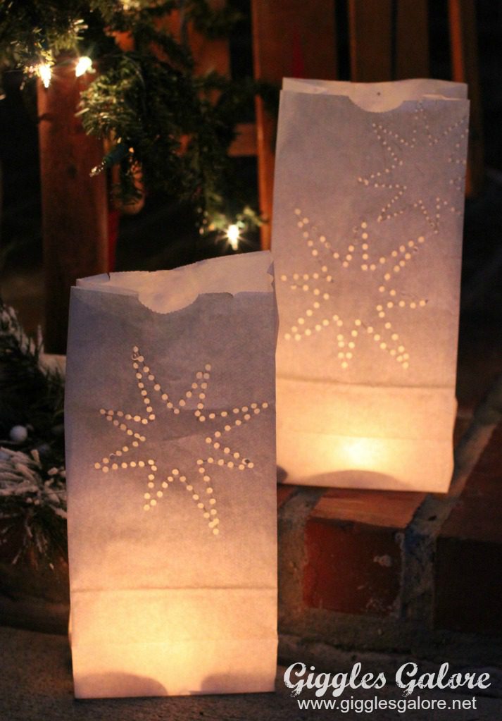 Paper Bag Luminaries Glowing paper bag luminaries with pine tree, as an example of Hispanic Heritage Month activities.