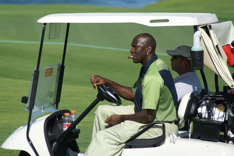 Famous People with ADHD Michael Jordan in a golf cart