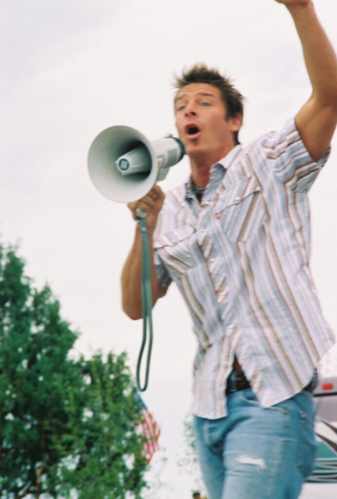 Famous People with ADHD Ty Pennington with a megaphone