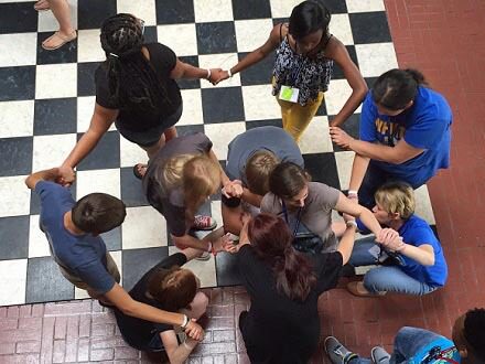 Human Knot Students holding hands and getting themselves into a human knot.