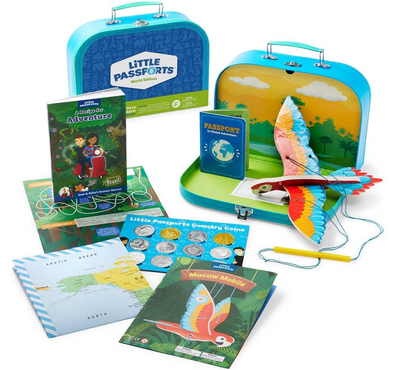 Educational Subscription Boxes: Little Passports Little Passports educational subscription box with books, coins, paper bird craft, and more country-themed items