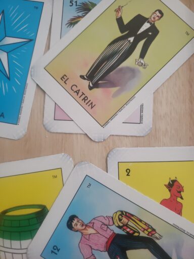 Loteria Loteria game cards on desk, as an example of Hispanic Heritage Month activities.