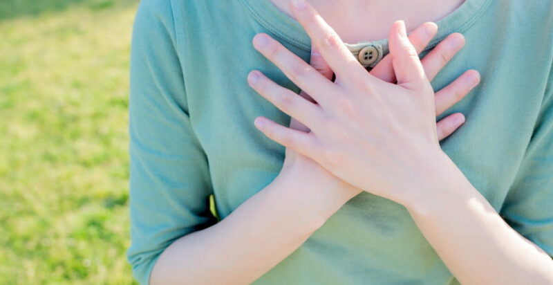 Loving Kindness A student's hands lay crossed on their chest