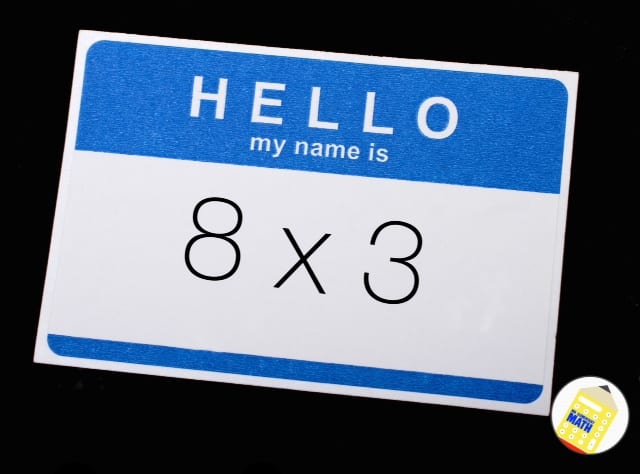 multiplication-nametag A "hello" name tag with the name written as 8x3 used to teach multiplication