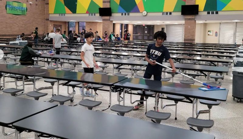 National Custodian Day Students helping to set up and clean lunch tables in honor of National Custodian Day