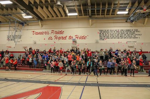Paper Airplane Students playing with paper airplanes in gymnasium