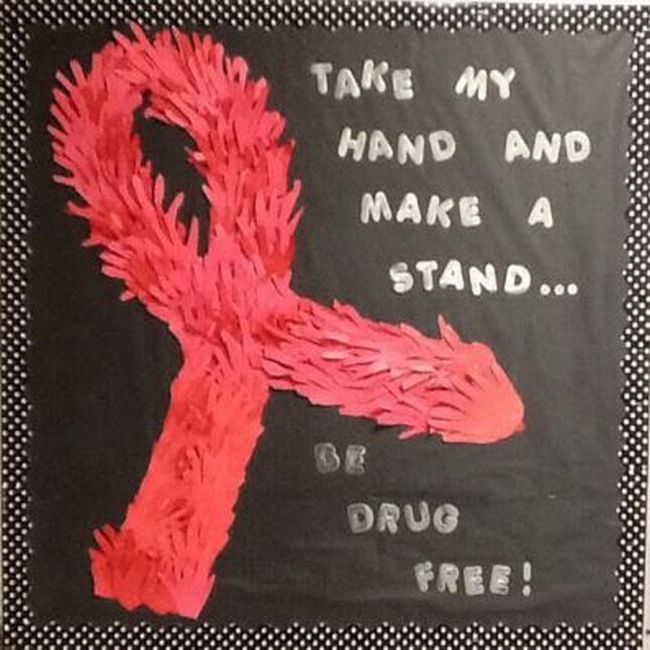 Red Ribbon Week Ideas: Bulletin Board Bulletin board featuring a red ribbon made from red handprints