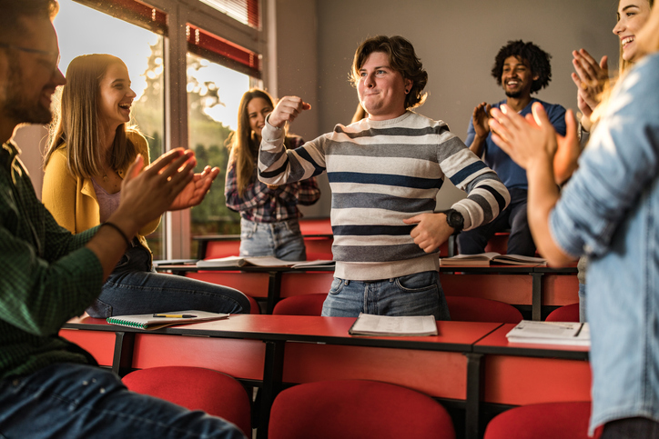 Teens Dancing Teenagers having fun dancing in a classroom