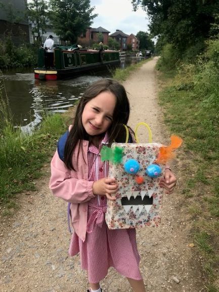 Worry Monsters A shy girl holding up a box decorated to look like a monster