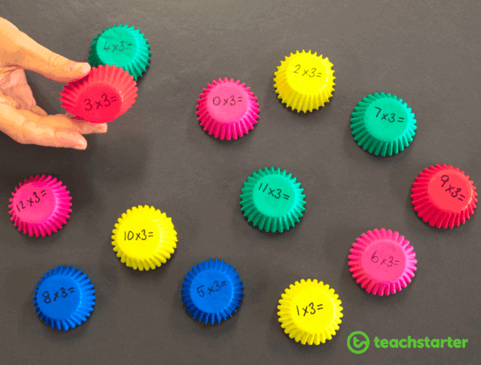 cupcake-math Teach multiplication using cupcake liners with multiplication problems written on them