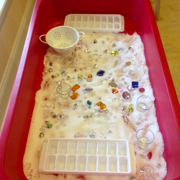 Sensory Bin A sensory bin filled with epsom salt, gems and more